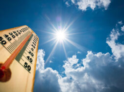 Thermometer Sun high Degres. Hot summer day. High Summer temperatures