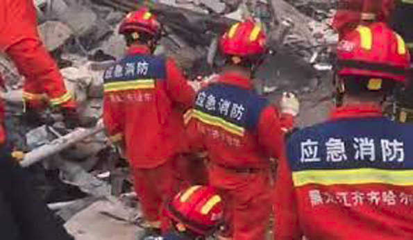 चीन में स्कूल के जिम की छत ढह जाने से नौ लोगों की मौत, दो लोग फंसे