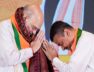 अमित शाह का अभिवादन करते शुभेंदु अधिकारी